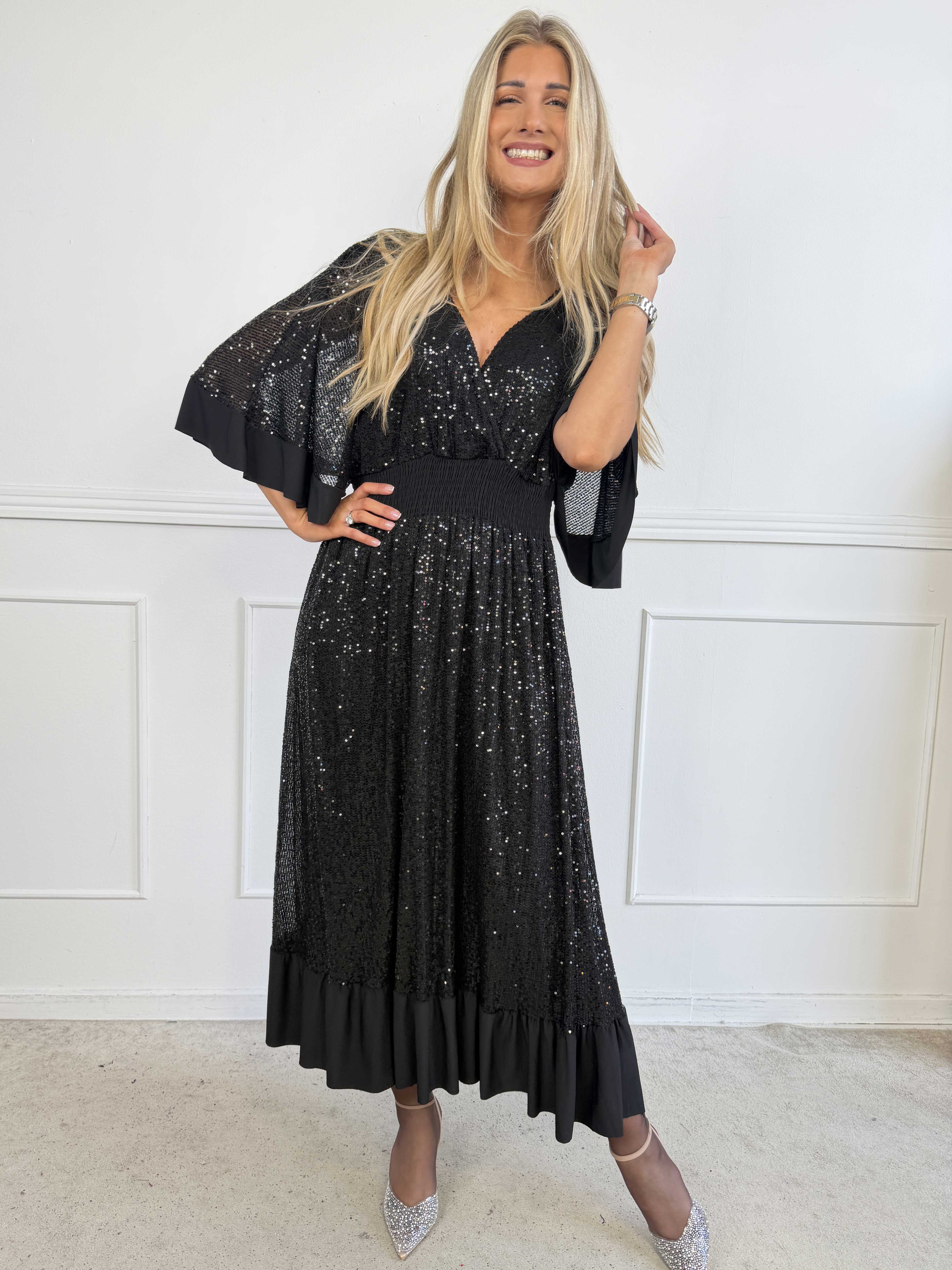 Pamela Glitter - Lång paljettklänning med volanger och smock